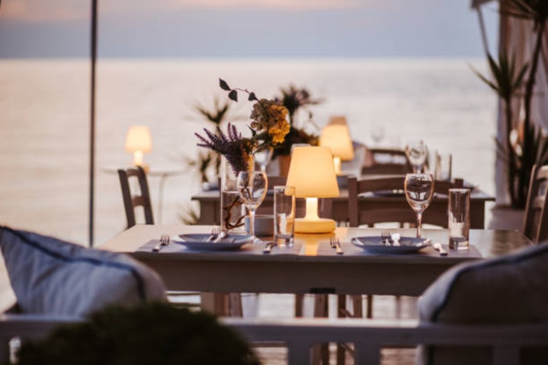 Dinner by the sea Dinner by the sea outdoor lamp stock pictures, royalty-free photos &amp; images